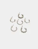 Set de tres pares de aros tipo argolla bañados en plata, con diferentes diseños: argolla trenzada, argolla con eslabones y argolla lisa.