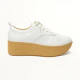 Zapatillas blancas de cuero con plataforma de yute trenzado.