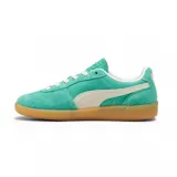 Championes Puma Palermo Vintage, color verde agua con detalles en beige y suela color caramelo.