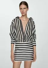 Minifalda ajustada de punto circular con estampado de rayas horizontales blancas y negras.