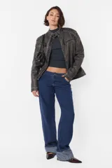 Top de morley manga larga gris, al cuerpo; largo camiseta.