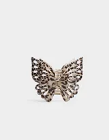Broche para el pelo con forma de mariposa con estampado animal print en tonos marrones y beige.