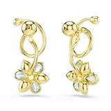 Par de caravanas asimétricas con forma de flor, con tallos en tono oro y pétalos multicolores elaborados con cristales de diferentes formas. Los motivos florales son desmontables.