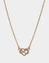 Cadena corta dorada con dije de corazón entrelazado con el símbolo de infinito, ambos adornados con strass.