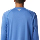 Remera de manga larga Columbia Terminal Tackle Heat, color gris jaspeado, con logo de la marca en el pecho y en la manga. Confeccionada en tejido transpirable de secado rápido y protección solar UPF 50.