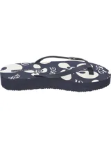 Ojotas Tommy Hilfiger con plataforma pequeña, base azul marino y tiras azules con logo de la marca. Plantilla estampada con flores y números en blanco.