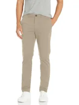 Pantalón de vestir color beige, corte slim, con cierre de botón y cremallera.