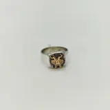 Anillo de plata 925 con aplique de tijeras y peine en oro 9k.