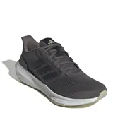 Championes de running Adidas modelo Ultrabounce para hombre en color gris, con mediasuela Bounce para amortiguación ligera y suela de caucho resistente. Presentan una parte superior de malla textil con refuerzos sintéticos y las icónicas tres tiras laterales.