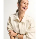 Reloj Fossil modelo Harlow con caja octogonal dorada de 27mm, esfera color crema con números romanos negros y malla metálica dorada.