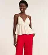 Pantalón wide leg de viscosa color marrón chocolate, con cintura alta, elástico en la espalda y cierre lateral.