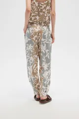 Pantalón de viscosa estampado, anudado, holgado y de calce medio.
