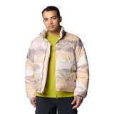 Campera puffer reversible color beige con cuello alto y cierre frontal con botones a presión. Tiene bolsillos laterales con doble entrada y puños elásticos.