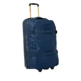 Bolso de viaje Rip Curl F-Light Global de 100L en color azul, con ruedas y asa retráctil.