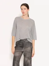 Sweater tejido con lurex, color beige, de silueta holgada y estilo remerón, con mangas cortas.