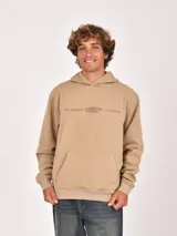 Hoodie color beige con capucha y bolsillo canguro frontal. Presenta un estampado minimalista en color marrón en el pecho con texto que incluye "GR Trademark", "Unfiltered Content" y "worldwide".