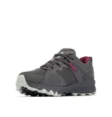 Zapatilla de senderismo Columbia Peakfreak Hera, color gris oscuro, con tecnología OutDry impermeable y transpirable. Presenta malla transpirable, soporte de media caña, sistema de cordones Navic Fit™ y entresuela TechLite+™ para amortiguación. La suela es Adapt Trax™ para tracción en seco y mojado.