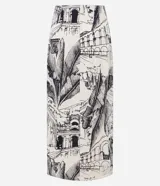 Pollera midi de viscosa y lino color crudo, con estampado de paisajes modernistas, nudo lateral y corte al bies.