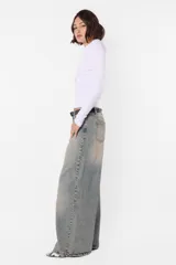 Top de morley manga larga gris, al cuerpo; largo camiseta.