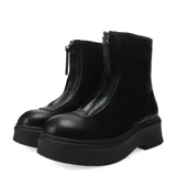 Botas Chelsea color blanco hueso con plataforma y cierre frontal con cremallera.