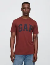 Remera amarilla de algodón con logo GAP estampado en blanco.