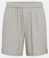 Bermuda deportiva gris con cintura elástica ajustable con cordón, bolsillos laterales y aberturas laterales en el bajo.