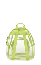 Mochila mini transparente con detalles en color lila pastel, marca JanSport.