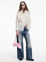 Camisa estampada a cuadros multicolor con botones en la parte delantera y cuello camisero.