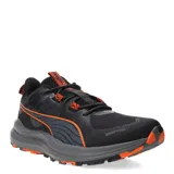 Championes Puma Reflect Lite Trail, color negro con detalles en naranja y gris.