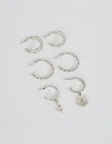 Set de tres pares de aros argollas plateadas: un par con strass, un par trenzadas y un par con dije de serpiente y dije de ojo turco.