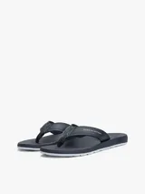 Ojotas Tommy Hilfiger azul marino con logo de la marca en la tira.