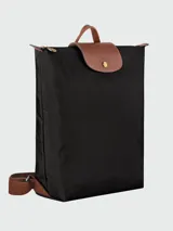 Mochila Longchamp modelo Le Pliage Original M, color crudo con detalles en cuero marrón.