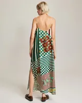 Vestido camisero largo con estampado de motivos del oeste, escote en V y tirantes finos. Aberturas laterales y corte holgado.