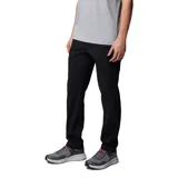Pantalón de senderismo negro, de corte recto, con múltiples bolsillos con cierre de velcro y cremallera. Cuenta con presilla utilitaria en la cintura y cordón ajustable.