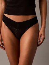 Colaless de encaje negro con cintura elástica con logo Calvin Klein.