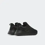 Championes Reebok Nano Gym color negro, ideales para correr, entrenar con pesas y clases de fitness. Diseño tipo botín con ajuste cómodo, base de TPU para soporte lateral y suela de EVA y goma.