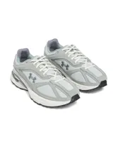 Zapatillas urbanas Under Armour HOVR Apparition unisex, color blanco con detalles en rosa y logo en negro.