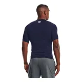 Remera deportiva blanca Under Armour HeatGear Armour de manga corta, corte ajustado y logo negro en el pecho.