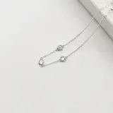 Pulsera de plata 925 con circonitas en engarce inglés, incluye dijes de 5mm.