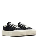 Championes urbanos Converse Cruise Low Top, color negro con detalles en blanco. Confeccionados en lona de algodón, con suela de goma y cordones.