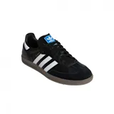 Championes Adidas Samba Og unisex, color negro con detalles en blanco y suela marrón.