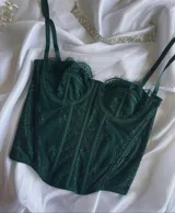 Corset de encaje color verde petróleo con breteles finos y espalda regulable.