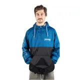 Campera anorak Thrasher de media cremallera, color azul con parte inferior negra y logo de la marca estampado en el pecho.