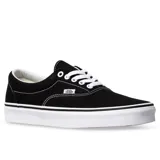 Championes Vans Era negros con costuras blancas y suela blanca.