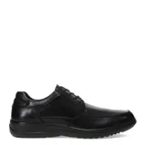 Zapato de vestir de cuero negro, con cordones y suela de goma.