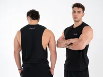 Musculosa unisex negra de algodón, con estampado serigráfico en el frente con la palabra "GAINS." y en la espalda con la palabra "PERSISTENCE".