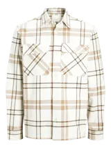 Sobrecamisa a cuadros color crema, marrón y blanco, de manga larga con cierre de botones y bolsillos en el pecho.