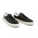 Championes Vans Old Lux negros de cuero con suela blanca.