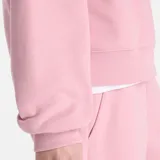 Buzo deportivo New Balance color rosa con logo bordado en el pecho.