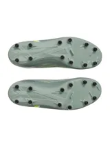 Championes de fútbol Under Armour Magnetico Select 4 FG, color verde con detalles en amarillo y negro. Diseño con cordones y tapones para césped natural.